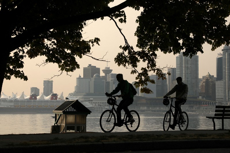 Suasana pusat kota yang diselimuti kabut asap kebakaran hutan, di Stanley Park di Vancouver, British Columbia, Kanada, Senin (21/8/2023). (REUTERS/Chris Helgren) Suasana pusat kota yang diselimuti kabut asap kebakaran hutan, di Stanley Park di Vancouver, British Columbia, Kanada, Senin (21/8/2023). (REUTERS/Chris Helgren)