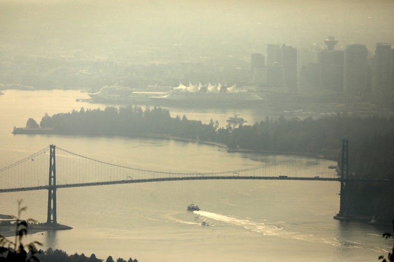 Suasana pusat kota yang diselimuti kabut asap kebakaran hutan, di Stanley Park di Vancouver, British Columbia, Kanada, Senin (21/8/2023). (REUTERS/Chris Helgren) Suasana pusat kota yang diselimuti kabut asap kebakaran hutan, di Stanley Park di Vancouver, British Columbia, Kanada, Senin (21/8/2023). (REUTERS/Chris Helgren)