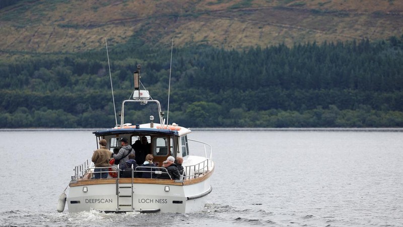 Volunteers take off in the Loch Ness Project Research Vessel, Deep Scan, as they take part in the largest Loch Ness Monster hunt for 50 years in Scotland, Britain, August 27, 2023. REUTERS/Russell Cheyne