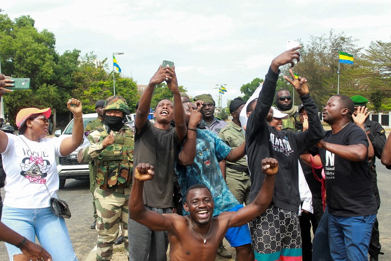 GABON-ELECTION/ Gabonese military appear on television as they announce that they have seized power following President Ali Bongo Ondimba's re-election, in this screengrab obtained by Reuters on August 30, 2023. Gabon 1ere/Handout via REUTERS THIS IMAGE HAS BEEN SUPPLIED BY A THIRD PARTY. TPX IMAGES OF THE DAY