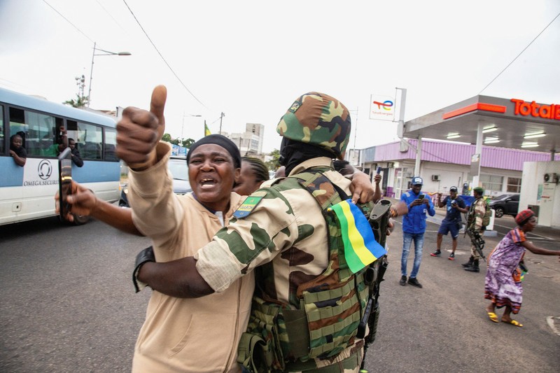 GABON-ELECTION/ Gabonese military appear on television as they announce that they have seized power following President Ali Bongo Ondimba's re-election, in this screengrab obtained by Reuters on August 30, 2023. Gabon 1ere/Handout via REUTERS THIS IMAGE HAS BEEN SUPPLIED BY A THIRD PARTY. TPX IMAGES OF THE DAY