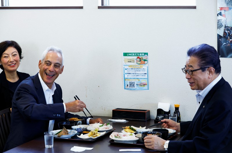 JAPAN-FUKUSHIMA/USA U.S. Ambassador to Japan Rahm Emanuel eats lunch with Soma Mayor Hidekiyo Tachiya at Restaurant Takohachi during his visit to show his support for the water discharge from the Fukushima Daiichi nuclear power plant, in Soma, Fukushima Prefecture, Japan, August 31, 2023. REUTERS/Kim Kyung-Hoon
