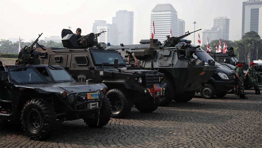 Kapolri Jenderal Listyo Sigit Prabowo bersama Panglima TNI Laksamana Yudo Margono memimpin Apel Gelar Pasukan Pengamanan KTT ASEAN ke-43 di Monas, Jakarta Pusat, Jumat (1/9/2023). (Dok. Detikcom/Azhar Bagas)