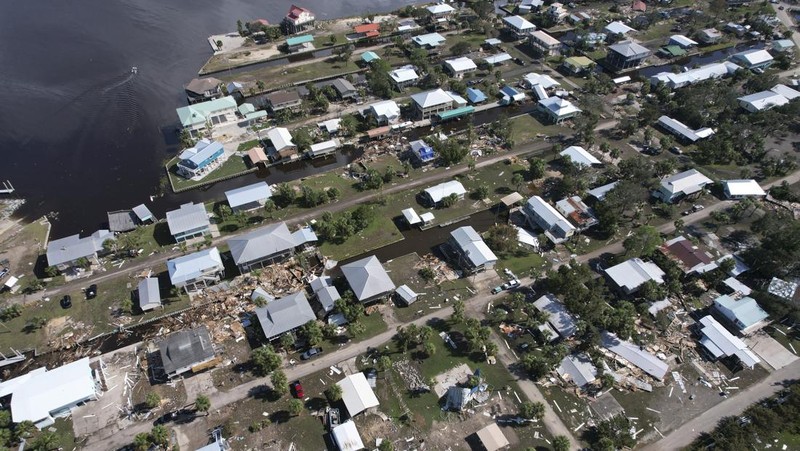 Negara bagian Florida di Amerika Serikat disapu Badai Tropis Idalia, yang membawa angin kencang hingga menyebabkan pemadaman listrik pada Rabu (31/8/2023) waktu setempat. (AP/Rebecca Blackwell)
