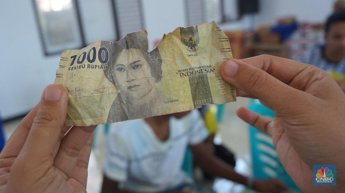 kriteria uang rusak yang diganti penuh oleh bank indonesia