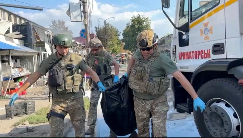 Emergency services work following an attack on the city of Kostiantynivka in eastern Ukraine, September 6, 2023, according to presidential adviser Mykhailo Podolyak, in this still image from video obtained from social media. (Volodymyr Zelenskiy Via Telegram/via REUTERS)