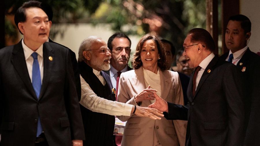 India’s Prime Minister Narendra Modi (2nd L) and Malaysia’s Prime Minister Anwar Ibrahim (2nd R) shake hands as they enter with US Vice President Kamala Harris (C) to attend the 18th East Asia Summit during the 43rd ASEAN Summit in Jakarta, Indonesia, on September 7, 2023. Yasuyoshi Chiba /Pool via REUTERS