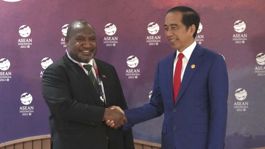 Indonesian President Joko Widodo, right, greets Papua New Guinea's Prime Minister James Marape after their bilateral meeting on the sidelines of the Association of Southeast Asian Nations (ASEAN) Summit in Jakarta, Indonesia, Thursday, Sept. 7, 2023. (AP Photo/Tatan Syuflana, Pool)