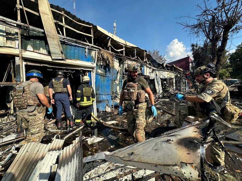 Emergency services work following an attack on the city of Kostiantynivka in eastern Ukraine, September 6, 2023, according to presidential adviser Mykhailo Podolyak, in this still image from video obtained from social media. (Volodymyr Zelenskiy Via Telegram/via REUTERS)