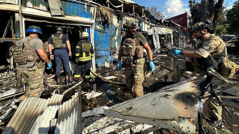 Emergency services work following an attack on the city of Kostiantynivka in eastern Ukraine, September 6, 2023, according to presidential adviser Mykhailo Podolyak, in this still image from video obtained from social media. (Volodymyr Zelenskiy Via Telegram/via REUTERS)