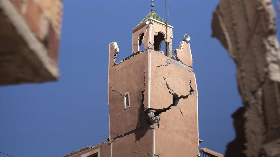 CORRECTS NAME OF VILLAGE A cracked mosque minaret stands after an earthquake in Moulay Brahim village, near Marrakech, Morocco, Saturday, Sept. 9, 2023. A rare, powerful earthquake struck Morocco late Friday night, killing more than 800 people and damaging buildings from villages in the Atlas Mountains to the historic city of Marrakech. But the full toll was not known as rescuers struggled to get through boulder-strewn roads to the remote mountain villages hit hardest. (AP Photo/Mosa'ab Elshamy)