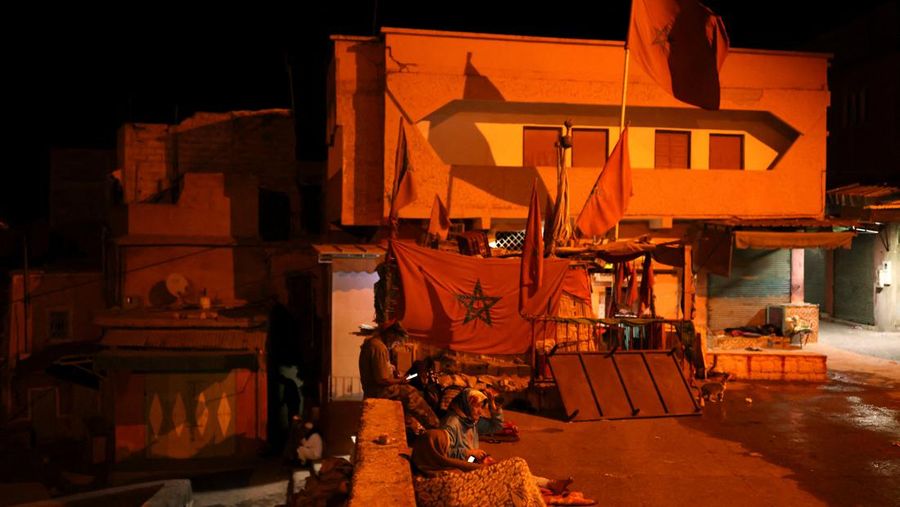Residents sleep on the street in Moulay Brahim village, in the province of Al Haouz, following a powerful earthquake in Morocco, September 9, 2023. REUTERS/Nacho Doce