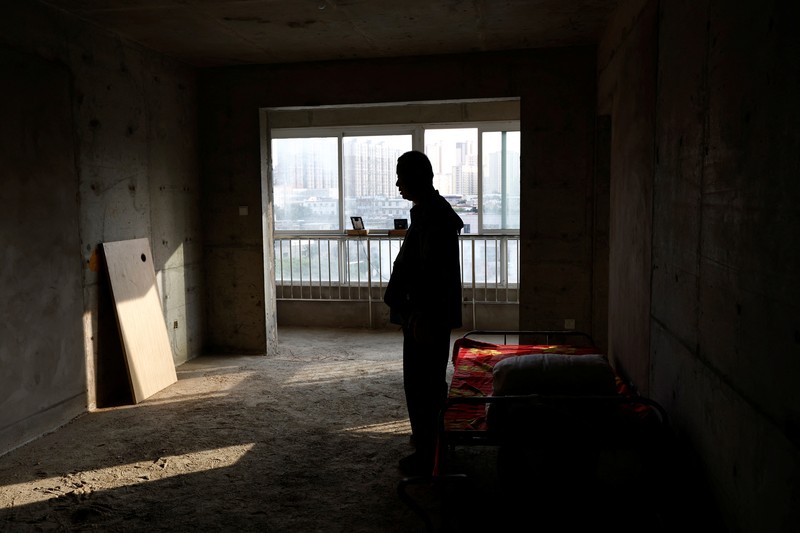 Kisah pembeli proyek apartemen di provinsi Shaanxi, China. (REUTERS/Tingshu Wang) Kisah pembeli proyek apartemen mangkrak di provinsi Shaanxi, China. (REUTERS/Tingshu Wang)