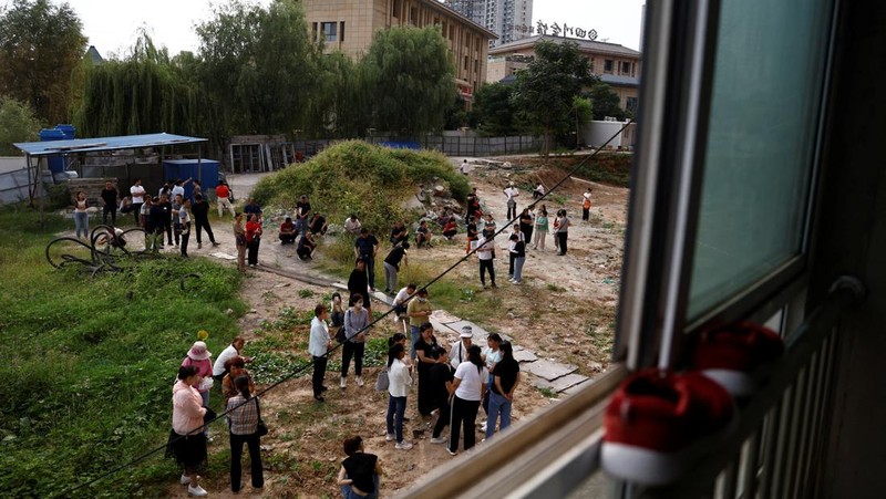 Kisah pembeli proyek apartemen mangkrak di provinsi Shaanxi, China. (REUTERS/Tingshu Wang)