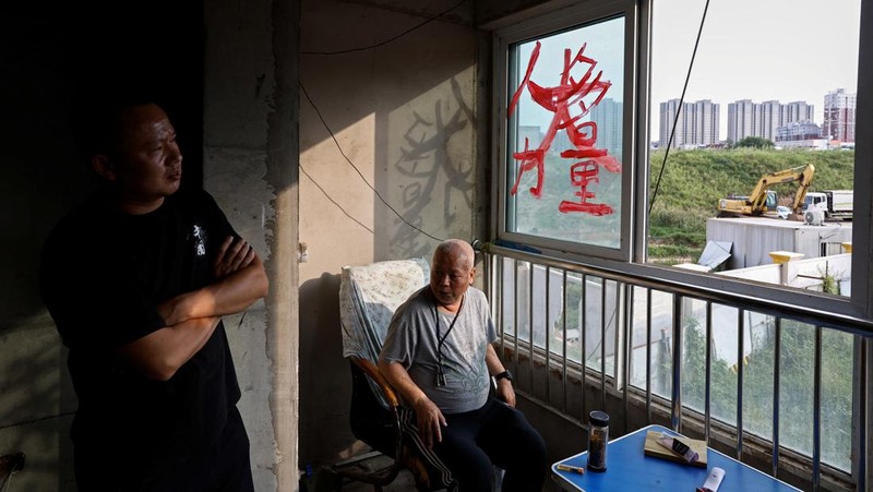 Kisah pembeli proyek apartemen mangkrak di provinsi Shaanxi, China. (REUTERS/Tingshu Wang)