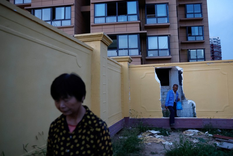 Kisah pembeli proyek apartemen di provinsi Shaanxi, China. (REUTERS/Tingshu Wang) Kisah pembeli proyek apartemen mangkrak di provinsi Shaanxi, China. (REUTERS/Tingshu Wang)