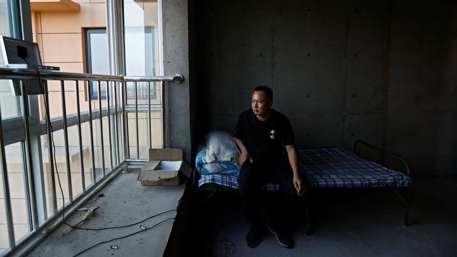 Kisah pembeli proyek apartemen mangkrak di provinsi Shaanxi, China. (REUTERS/Tingshu Wang)