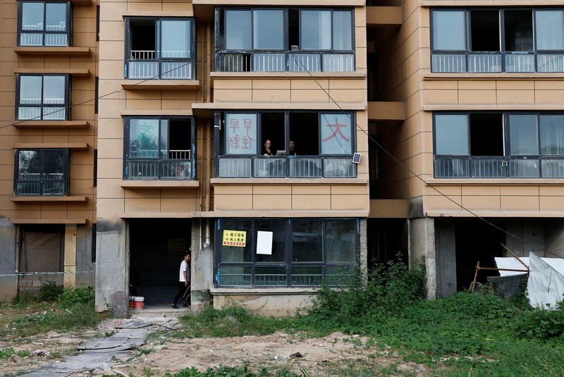 Kisah pembeli proyek apartemen mangkrak di provinsi Shaanxi, China. (REUTERS/Tingshu Wang)
