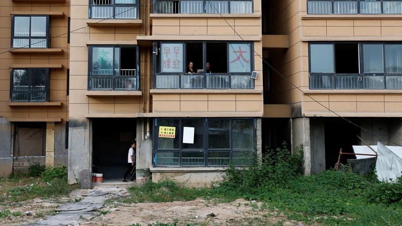 Kisah pembeli proyek apartemen mangkrak di provinsi Shaanxi, China. (REUTERS/Tingshu Wang)