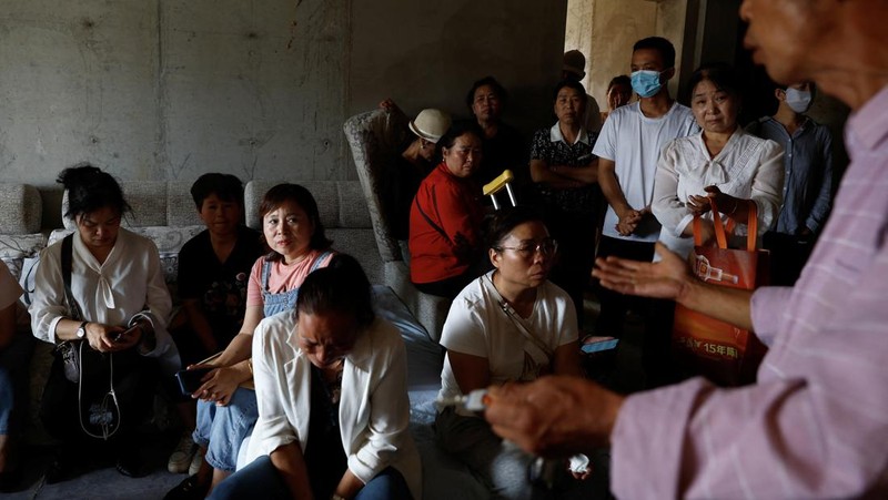 Kisah pembeli proyek apartemen mangkrak di provinsi Shaanxi, China. (REUTERS/Tingshu Wang)