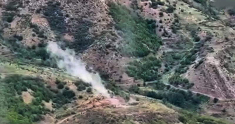 In this photo taken from video released by Defense Ministry of Azerbaijan on Tuesday, Sept. 19, 2023, smoke rises over an area which Azerbaijan says hosts Armenian forces' positions in the breakaway territory of Nagorno-Karabakh in Azerbaijan. Azerbaijan on Tuesday declared that it started what it called an 
