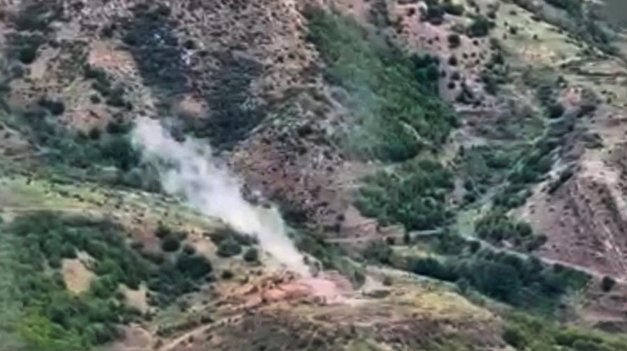 In this photo taken from video released by Defense Ministry of Azerbaijan on Tuesday, Sept. 19, 2023, smoke rises over an area which Azerbaijan says hosts Armenian forces' positions in the breakaway territory of Nagorno-Karabakh in Azerbaijan. Azerbaijan on Tuesday declared that it started what it called an 