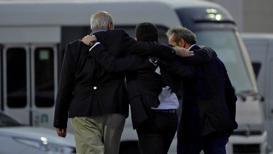 Siamak Namazi, Morad Tahbaz and Emad Shargi, who were released during a prisoner swap deal between U.S. and Iran, arrive at Doha International Airport, Qatar September 18, 2023. REUTERS/Mohammed Dabbous