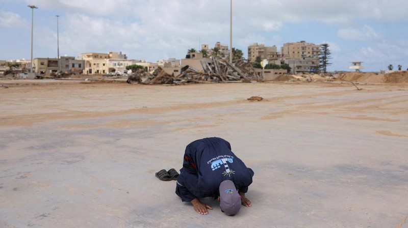 A man inspects a damaged mosque, in the aftermath of a deadly storm and flooding that hit Libya, in Derna, Libya September 20, 2023. REUTERS/Esam Omran Al-fetori