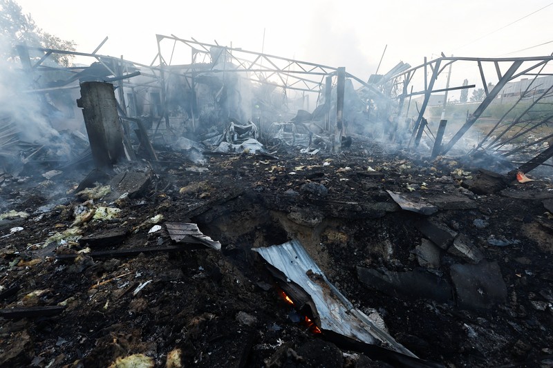 A firefighter works at a site in a residential area, damaged during a Russian missile strike, amid Russia’s attack on Ukraine, in Kyiv, Ukraine September 21, 2023. REUERS/Valentyn Ogirenko