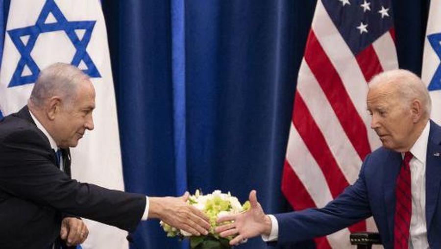 US President Joe Biden shakes hands with Israeli Prime Minister Benjamin Netanyahu as they meet on the sidelines of the 78th United Nations General Assembly in New York City on September 20, 2023. (Photo by Jim WATSON / AFP)