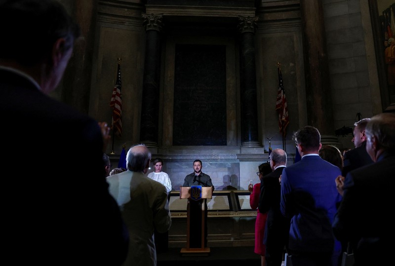 President of Ukraine Volodymyr Zelenskiy thanks Americans for their support of Ukraine in the war with Russia, alongside his wife Olena Zelenska, during a speech at the National Archives in Washington, U.S., September 21, 2023. REUTERS/Evelyn Hockstein