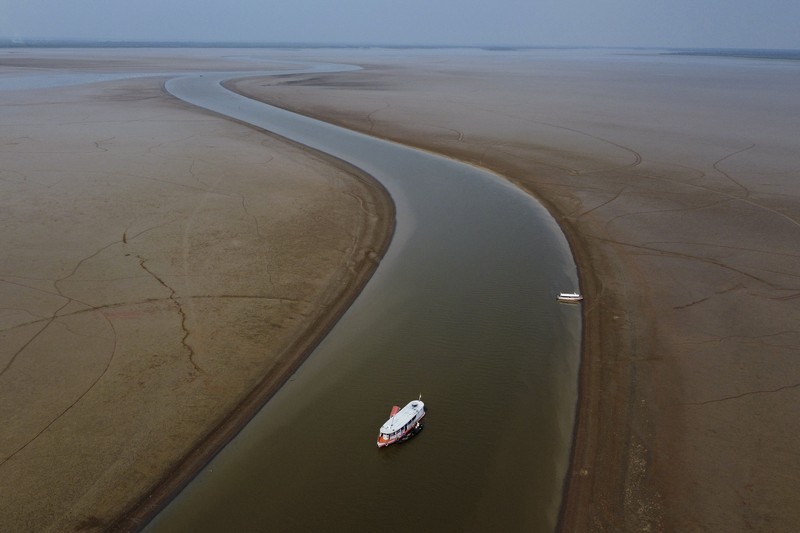 Foto udara menujukkan sebagian Sungai Amazon yang terkena dampak kekeringan parah di negara bagian Amazonas, dekat Manacapuru, Brasil, Rabu, 27 September 2023. (AP Photo/Edmar Barros) Foto udara menujukkan sebagian Sungai Amazon yang terkena dampak kekeringan parah di negara bagian Amazonas, dekat Manacapuru, Brasil, Rabu, 27 September 2023. (AP Photo/Edmar Barros)