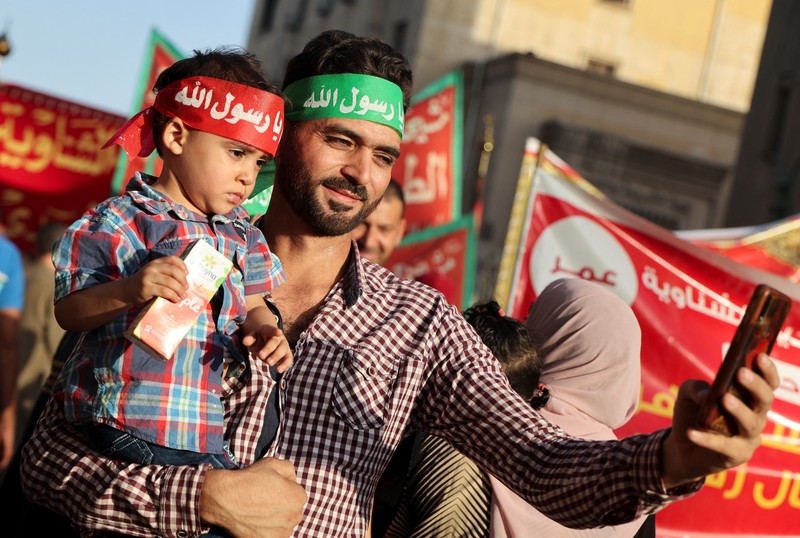 Perayaan Maulid Nabi di distrik Al Azhar, Kairo Lama, Mesir, 27 September 2023. (REUTERS/AMR ABDALLAH DALSH)
