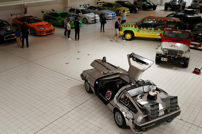 Pemandangan replika DeLorean DMC-12 yang ditampilkan dalam film Back to the Future di antara kendaraan legendaris dan replika mobil dari dunia perfilman dan televisi yang dipajang di museum Pop Central di Etrechy, dekat Paris, Prancis, 17 September 2023. Pemandangan replika DeLorean DMC-12 yang ditampilkan dalam film Back to the Future di antara kendaraan legendaris dan replika mobil dari dunia perfilman dan televisi yang dipajang di museum Pop Central di Etrechy, dekat Paris, Prancis, 17 September 2023. (REUTERS/Noemie Olive)