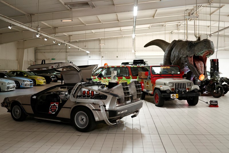 Pemandangan replika DeLorean DMC-12 yang ditampilkan dalam film Back to the Future di antara kendaraan legendaris dan replika mobil dari dunia perfilman dan televisi yang dipajang di museum Pop Central di Etrechy, dekat Paris, Prancis, 17 September 2023. Pemandangan replika DeLorean DMC-12 yang ditampilkan dalam film Back to the Future di antara kendaraan legendaris dan replika mobil dari dunia perfilman dan televisi yang dipajang di museum Pop Central di Etrechy, dekat Paris, Prancis, 17 September 2023. (REUTERS/Noemie Olive)