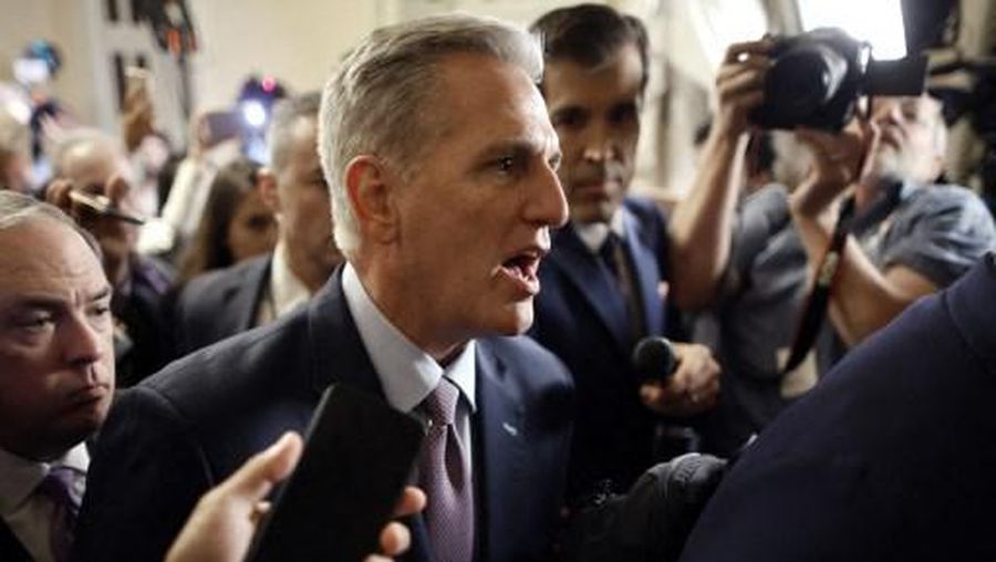 WASHINGTON, DC - OCTOBER 03: (EDITOR'S NOTE: Alternate crop) Speaker of the House Kevin McCarthy (R-CA) is surrounded by staff, security and journalists as he walks to the House Chamber ahead of a vote at the U.S. Capitol on October 03, 2023 in Washington, DC. McCarthy's speakership is being challenged by a handful of conservative members of his own party lead by Rep. Matt Gaetz (R-FL) following a deal to keep the federal government from partially shutting down over the weekend. Chip Somodevilla/Getty Images/AFP (Photo by CHIP SOMODEVILLA / GETTY IMAGES NORTH AMERICA / Getty Images via AFP)