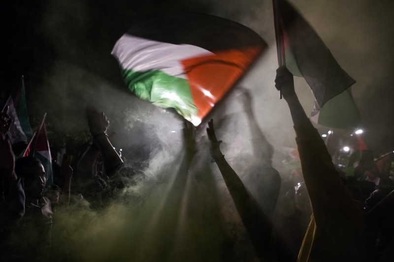 ISRAEL-PALESTINIANS/GAZA-IRAN Iranian celebrate during a gathering in support of Palestinians, in Tehran, Iran, October 7, 2023. Majid Asgaripour/WANA (West Asia News Agency) via REUTERS. ATTENTION EDITORS - THIS IMAGE HAS BEEN SUPPLIED BY A THIRD PARTY.