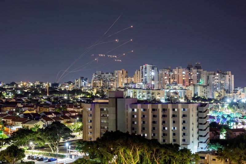 ISRAEL-PALESTINIANS/ Israel's Iron Dome anti-missile system intercepts rockets launched from the Gaza Strip, as seen from Ashkelon in southern Israel October 7, 2023. REUTERS/Amir Cohen