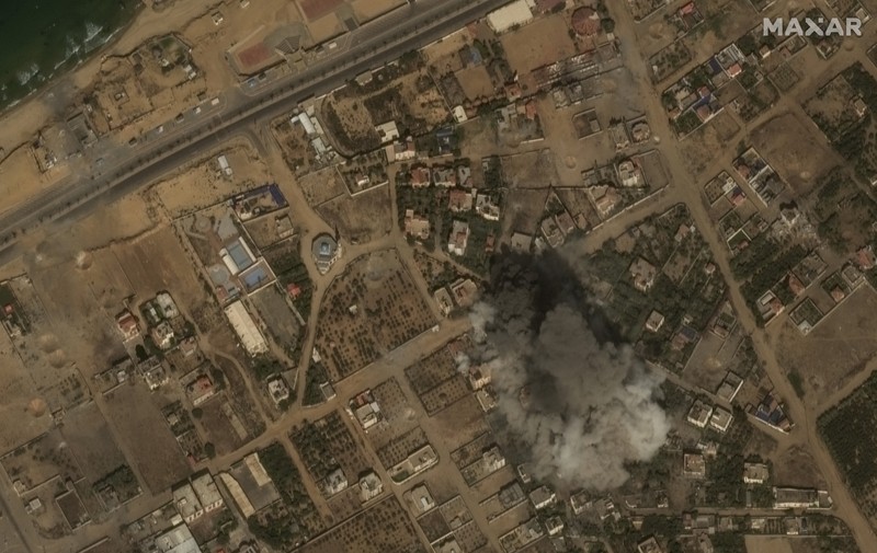 Israel Palestinians This image provided by Maxar Technologies, shows the destroyed Watan Tower in Gaza, Tuesday Oct. 10, 2023. (Satellite image ©2023 Maxar Technologies via AP)