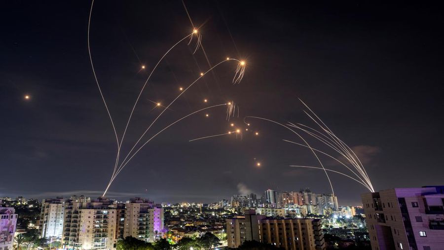 Israel's Iron Dome anti-missile system intercepts rockets launched from the Gaza Strip, as seen from Ashkelon in southern Israel October 8, 2023. REUTERS/Amir Cohen