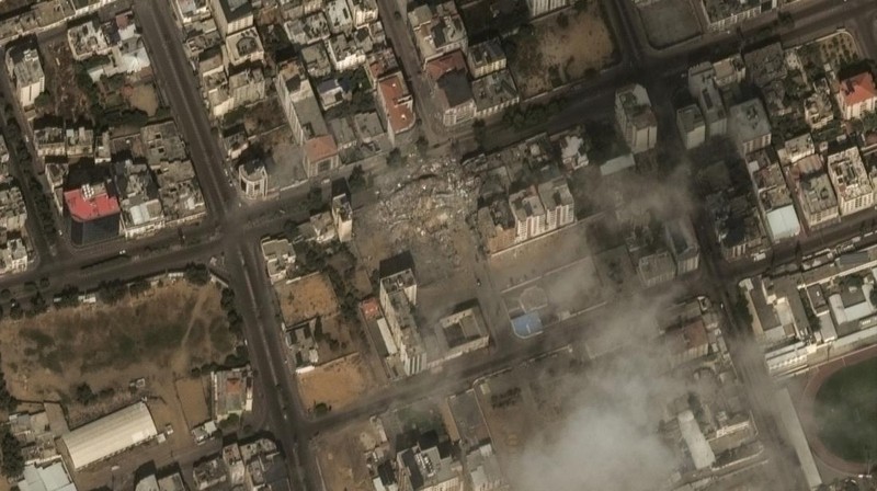 This image provided by Maxar Technologies, shows the destroyed Watan Tower in Gaza, Tuesday Oct. 10, 2023. (Satellite image ©2023 Maxar Technologies via AP)