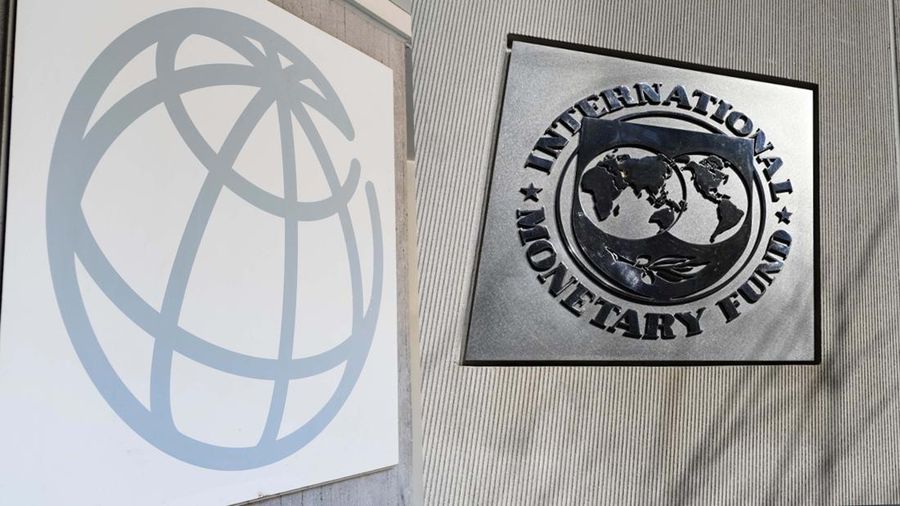 Foto kolase Wolrd Bank dan international monetary fund. (AP/Andrew Harnik dan AFP/OLIVIER DOULIERY)