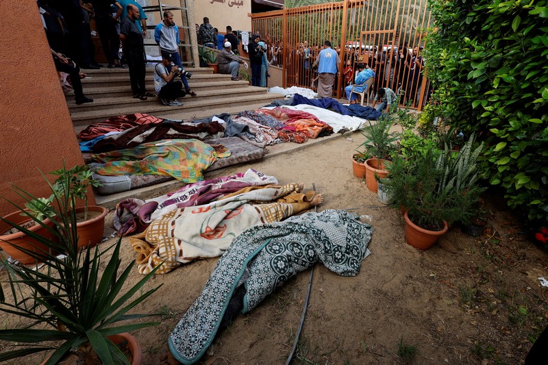 Jenazah warga Palestina yang tewas dalam serangan Israel dibaringkan di sebuah rumah sakit di Khan Younis di Jalur Gaza selatan (REUTERS/Mohammed Salem) Jenazah warga Palestina yang tewas dalam serangan Israel dibaringkan di sebuah rumah sakit di Khan Younis di Jalur Gaza selatan (REUTERS/Mohammed Salem)