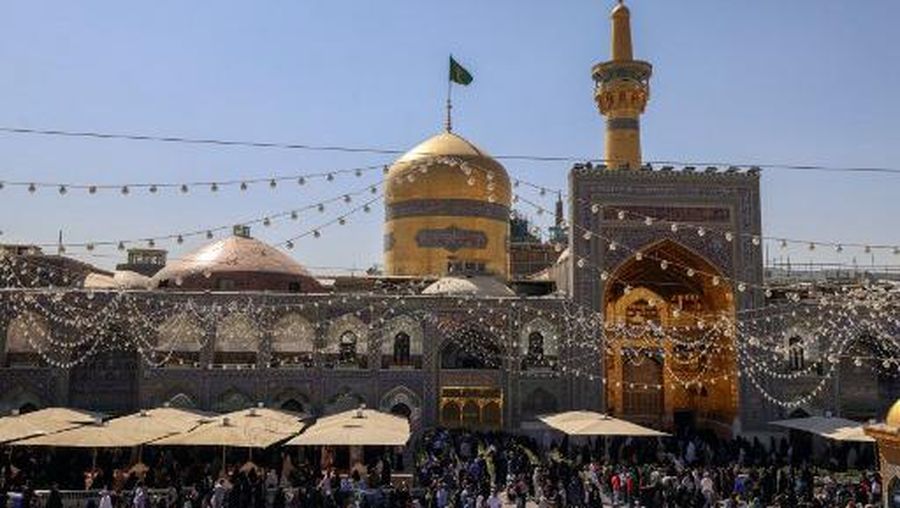 Pilgrims gather at the shrine of Imam Reza, the eighth imam in Twelver Shia Islam, in the city of Mashhad, the capital of the province of Khorassan-e Razavi in northeastern Iran, on October 1, 2023. (Photo by ATTA KENARE / AFP)