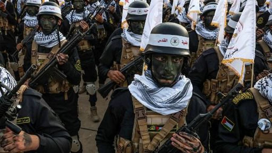 Palestinian Islamic Jihad militants parade during a rally marking the 36th anniversary of the movement's foundation, in Gaza City on October 6, 2023. (Photo by Mohammed ABED / AFP)