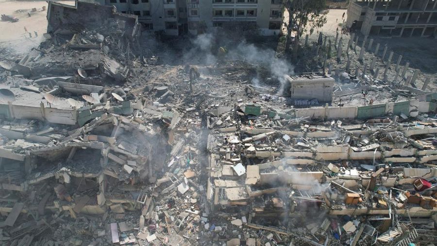 Residential buildings destroyed in Israeli strikes are seen in Zahra City, amid the ongoing conflict between Israel and Palestinian Islamist group Hamas, in southern Gaza City, October 19, 2023. REUTERS/Shadi Tabatibi