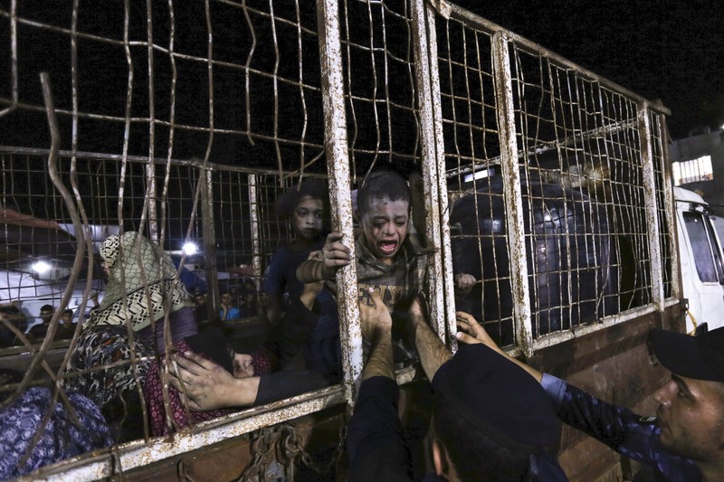 Israel Palestinians Wounded Palestinians arrive at the al-Shifa hospital, on a truck, following Israeli airstrikes on Gaza City, central Gaza Strip, Thursday, Oct. 19, 2023. (AP Photo/Abed Khaled)