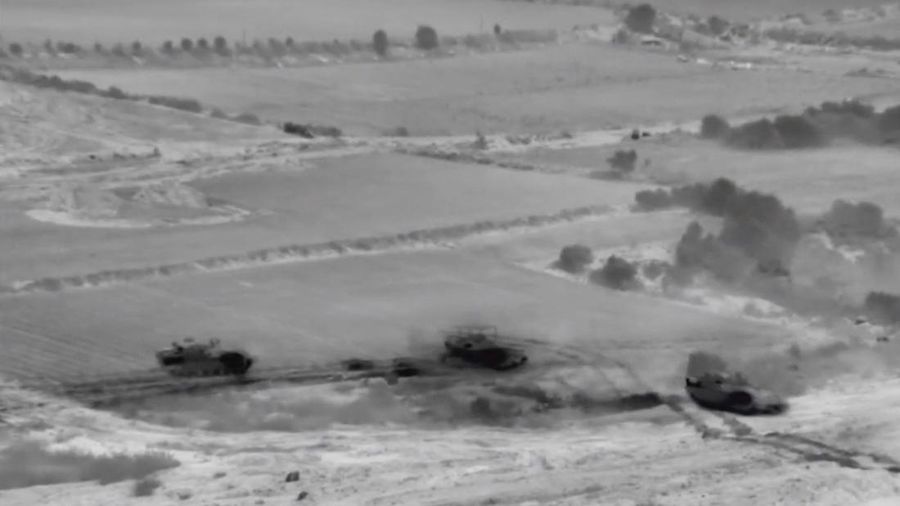 Kendaraan lapis baja Israel mengambil bagian dalam operasi, ketika konflik antara Israel dan Hamas berlanjut, di lokasi yang disebut sebagai Jalur Gaza utara dalam gambar diam yang diambil dari video selebaran yang dirilis pada 26 Oktober 2023. (Israel Defense Forces/Handout via REUTERS)