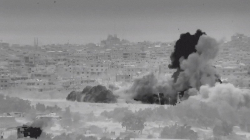 Kendaraan lapis baja Israel mengambil bagian dalam operasi, ketika konflik antara Israel dan Hamas berlanjut, di lokasi yang disebut sebagai Jalur Gaza utara dalam gambar diam yang diambil dari video selebaran yang dirilis pada 26 Oktober 2023. (Israel Defense Forces/Handout via REUTERS)