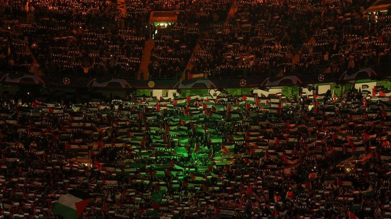 Soccer Football - Champions League - Group E - Celtic v Atletico Madrid - Celtic Park, Glasgow, Scotland, Britain - October 25, 2023 Celtic fans display Palestinian flags in support of Palestine amid the ongoing conflict between Israel and the Palestinian Islamist group Hamas before the match Action Images via Reuters/Jason Cairnduff